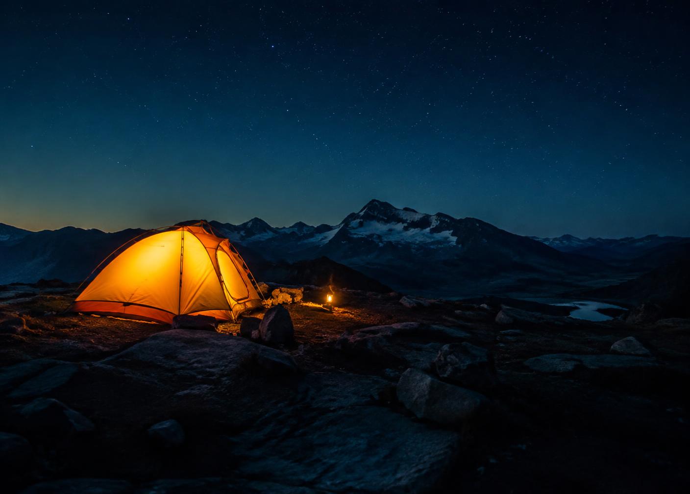 A glowing tent on a mountain plateau under a starry sky